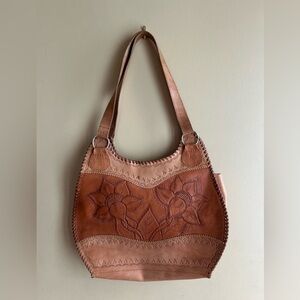 Tooled leather shoulder bag
